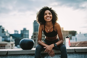 Patient in Columbia exercising with dental implants